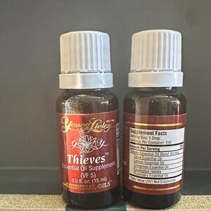 Young Living Thieves Essential Oil - Red and White
